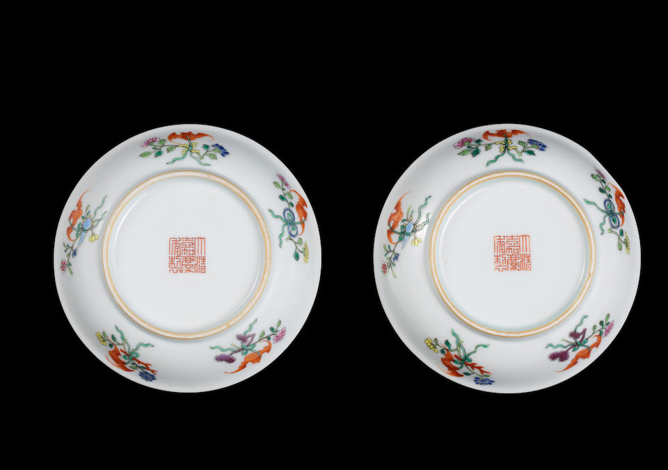 A pair of famille rose yellow-ground 'bajixiang' dishes Jiaqing seal marks and of the period