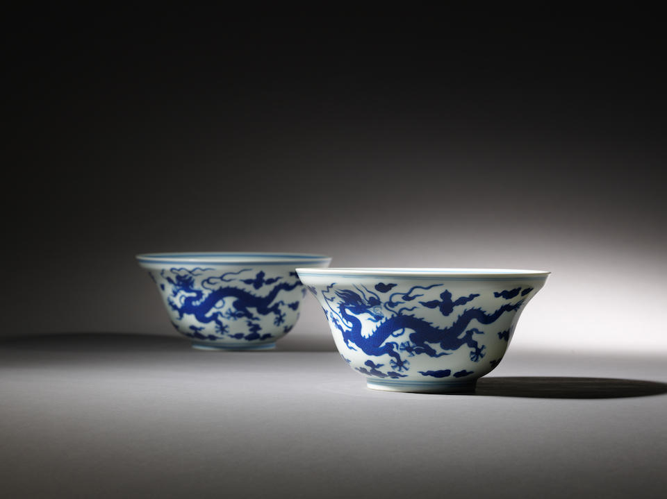 A pair of blue and white ogee-shaped 'dragon' bowls Qianlong seal marks and of the period