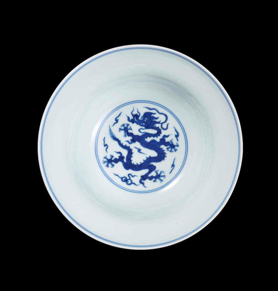 A pair of blue and white ogee-shaped 'dragon' bowls Qianlong seal marks and of the period