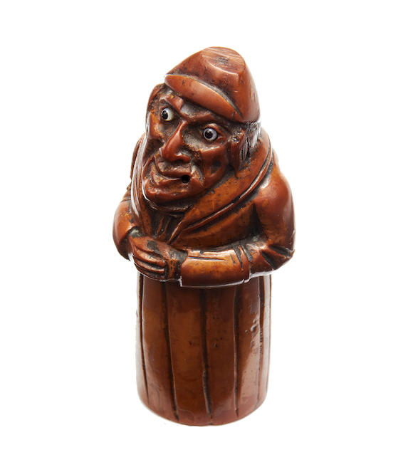 Bonhams : An early 19th century carved coquilla nut figural snuff box ...