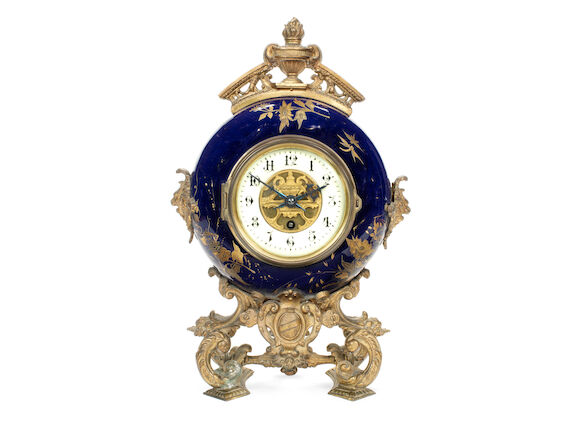 Bonhams : A late 19th century porcelain and gilt metal mounted mantel ...
