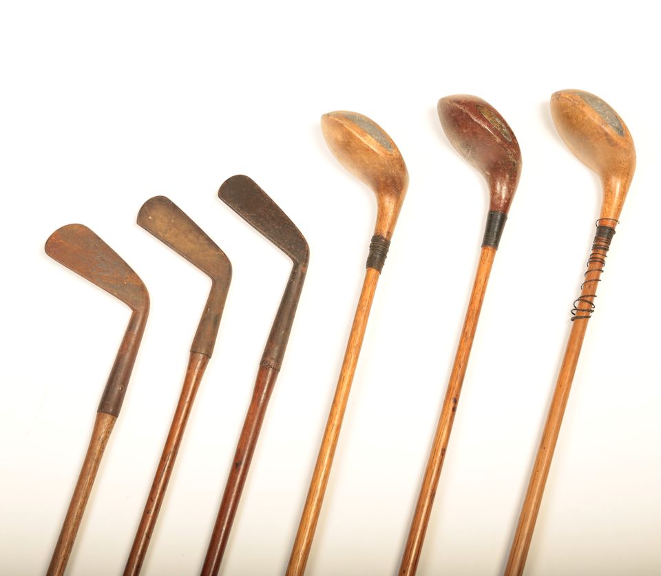 Bonhams A collection of wooden shafted golf clubs To include a W