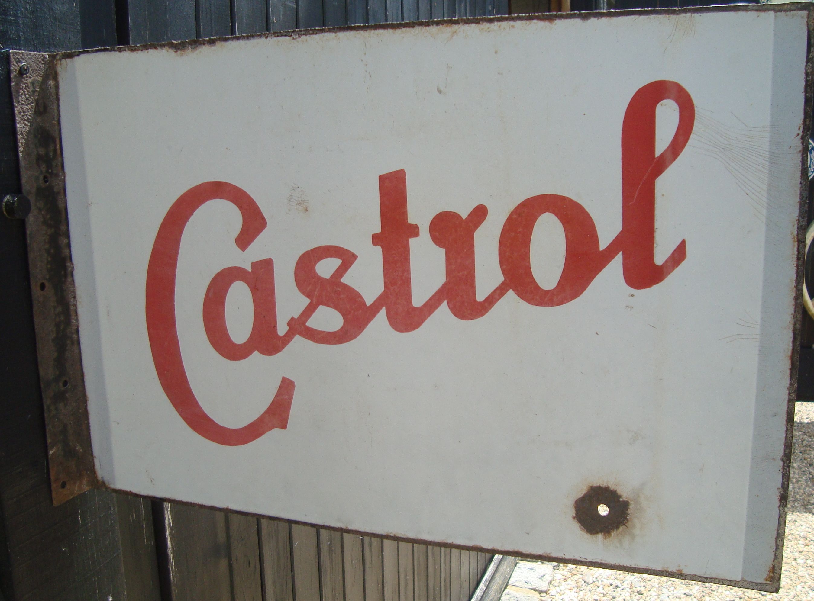 Bonhams Cars : Two Castrol enamel signs,