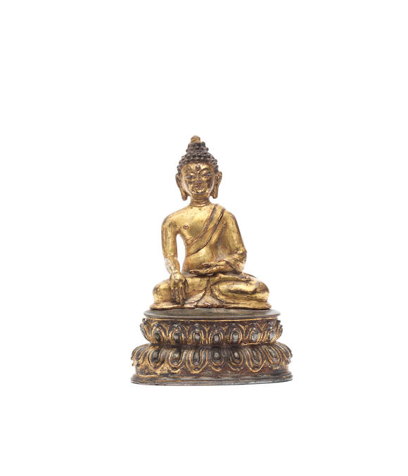 Bonhams : A gilt-bronze figure of Buddha Akshobhya 16th century