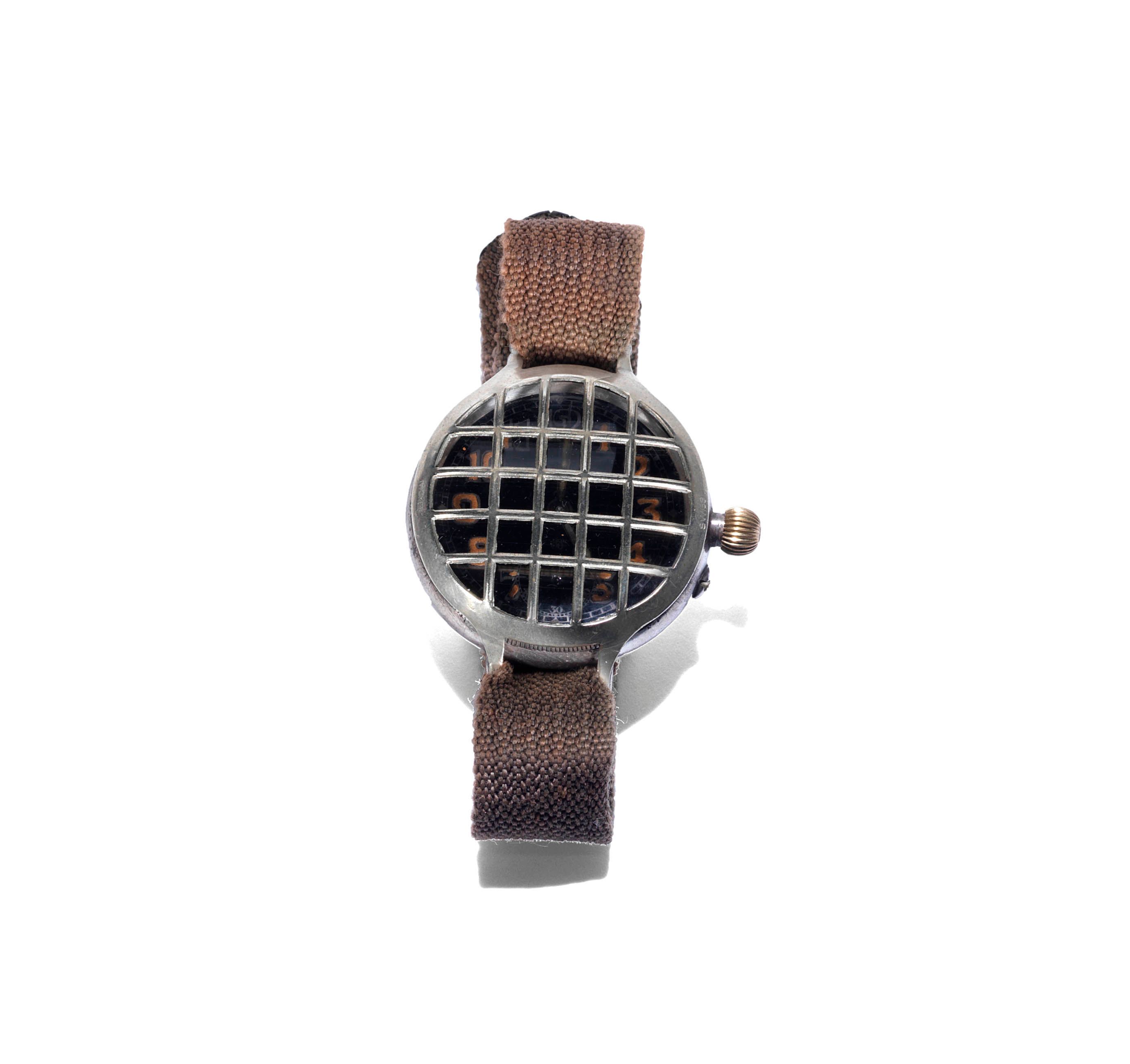 A silver borgel case Trench watch with black dial and Bonhams