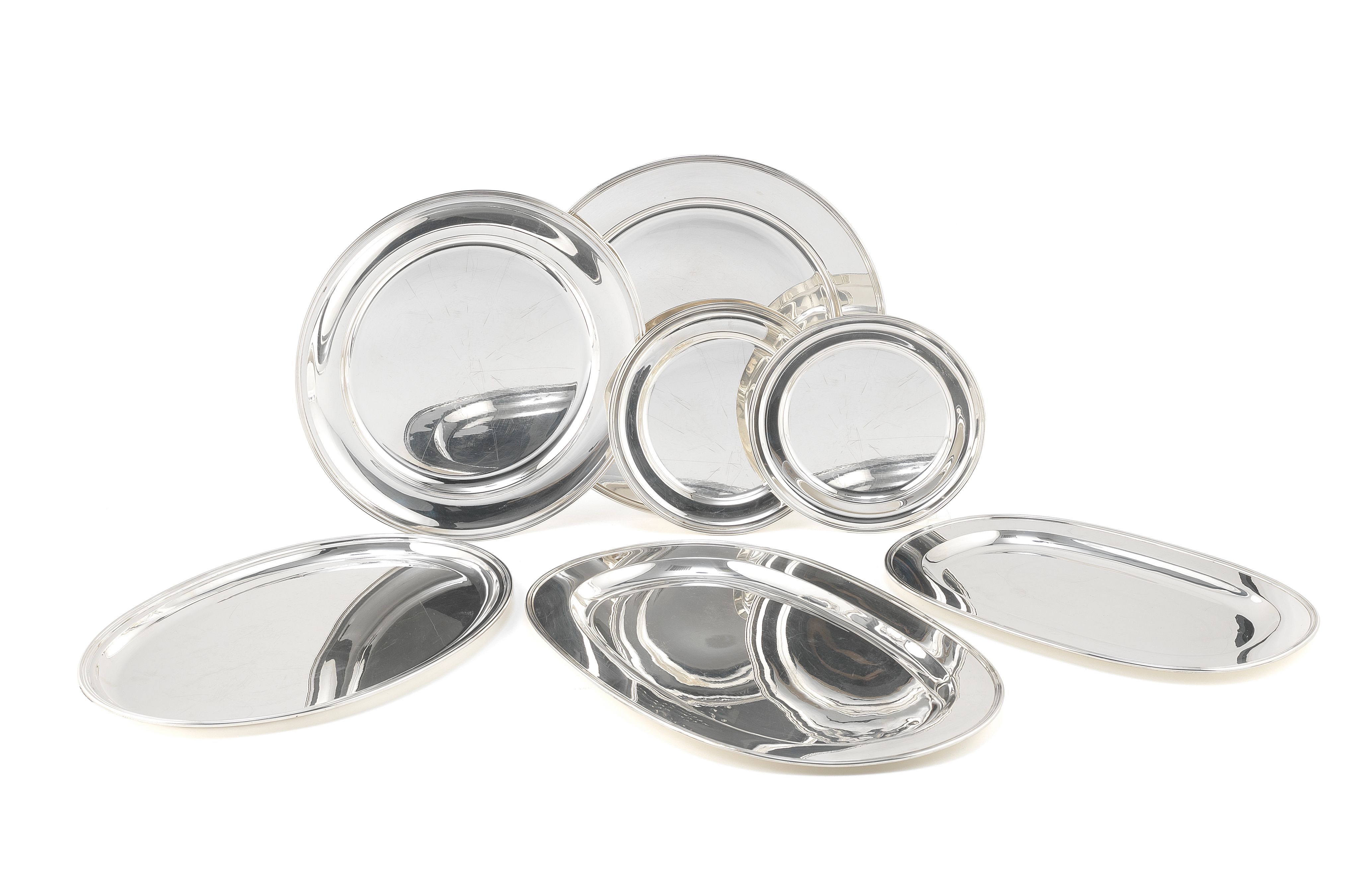 Bonhams Seven varying Italian metalware oval and circular platters pre and post1968 marks