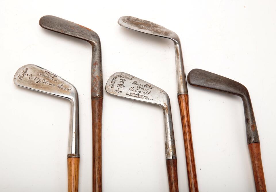 Bonhams A collection of wooden shafted golf clubs, woods, irons and