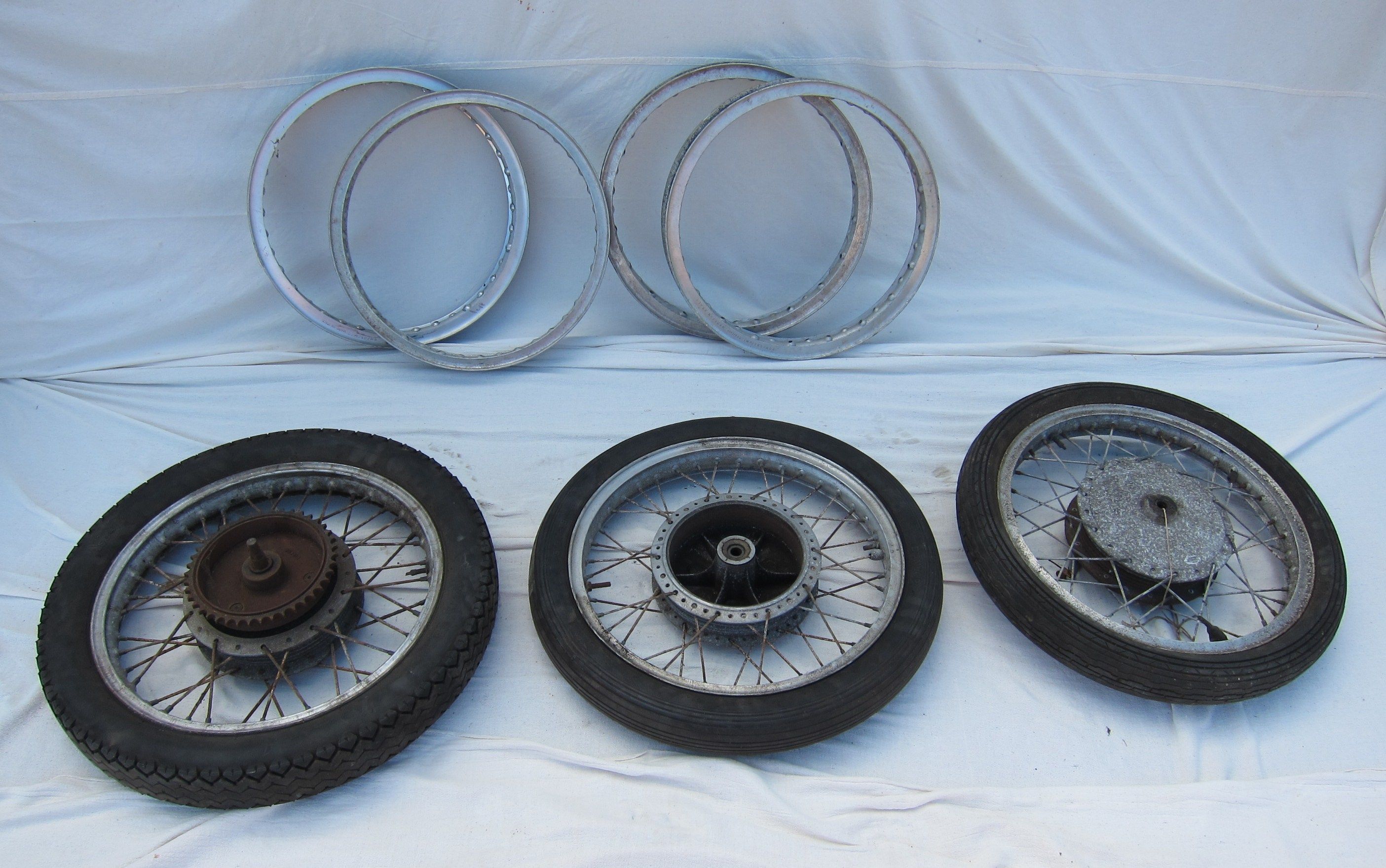 Bonhams Cars Three Norton wheels with alloy rims,