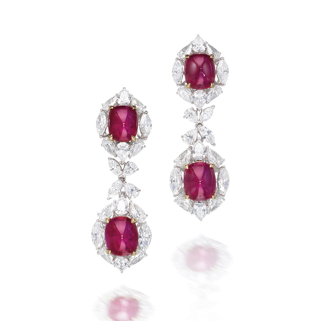 Bonhams A pair of ruby and diamond earrings, by Harry Winston