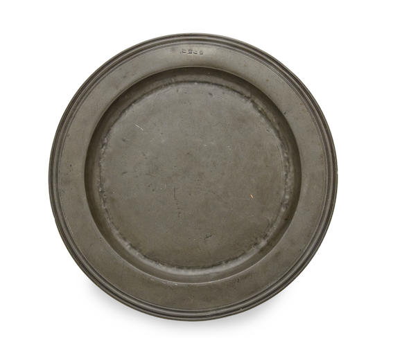 Bonhams : A multiple reeded pewter dish