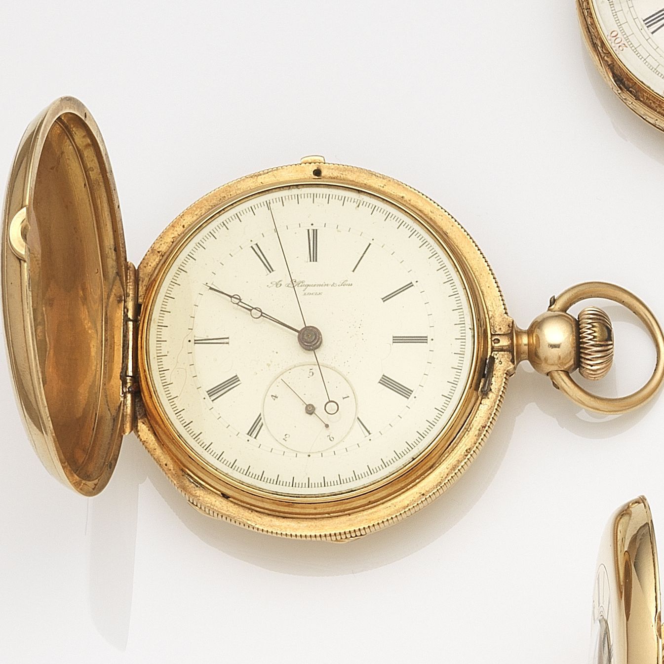 Bonhams A. Huguenin & Sons, Locle. An 18ct gold keyless wind