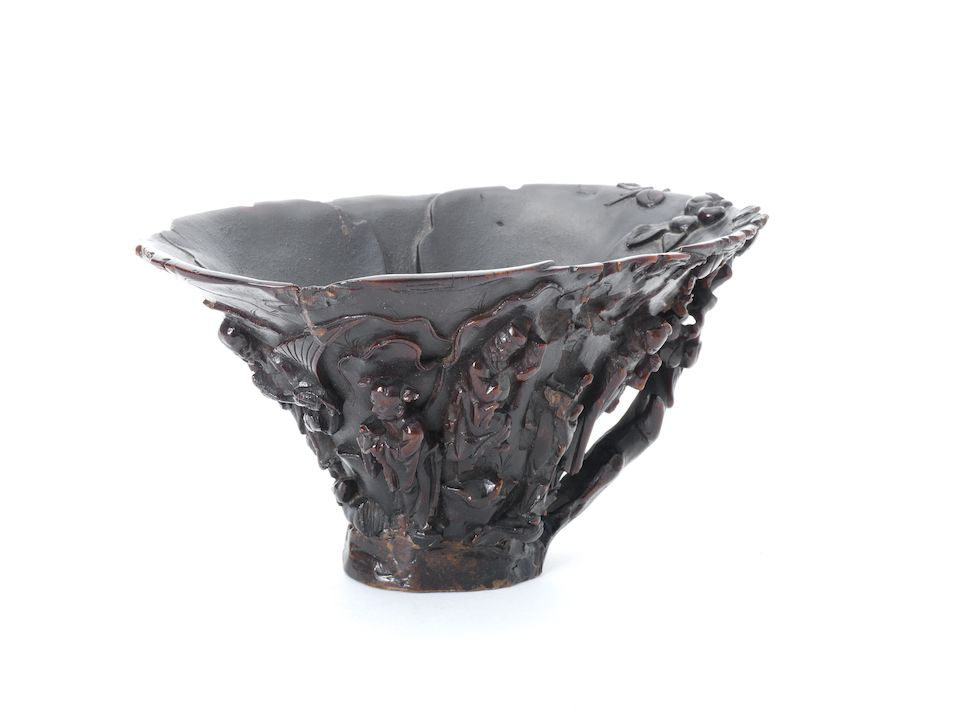 A large 'Shoulao and Eight Immortals' rhinoceros horn libation cup 17th/18th century