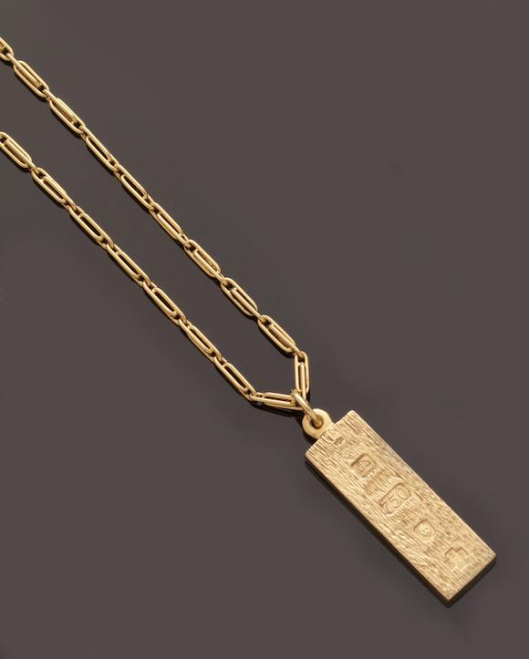 Bonhams : An 18ct gold ingot pendant on chain