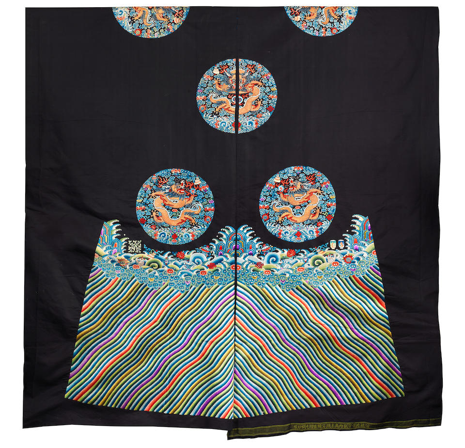 An uncut blue-ground 'dragon roundels' robe Late Qing Dynasty