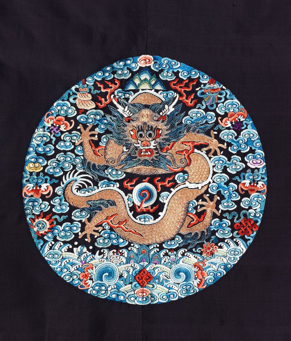 An uncut blue-ground 'dragon roundels' robe Late Qing Dynasty