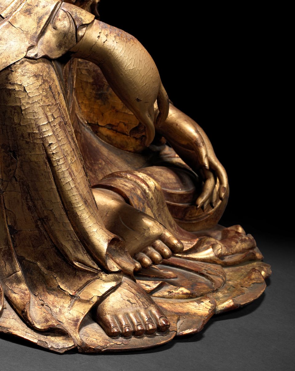 A rare and large gilt-lacquered wood figure of Guanyin 17th/18th century
