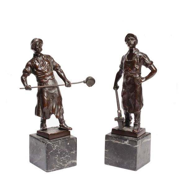 Bonhams L. Graefner (German) A pair of bronze figures of blacksmiths