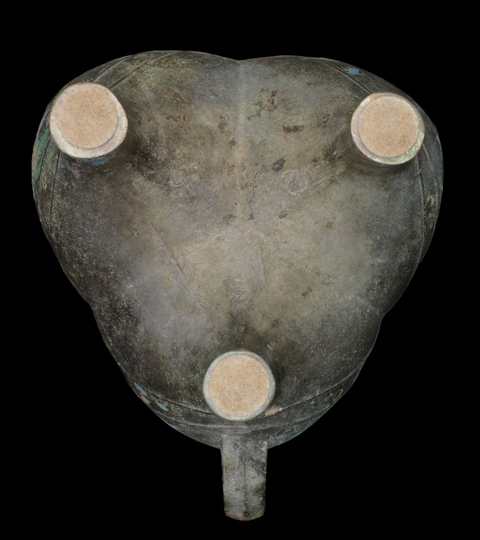 A rare archaic bronze ritual inscribed tripod wine vessel, jia Late Shang/early Western Zhou Dynasty, 12th-11th century BC