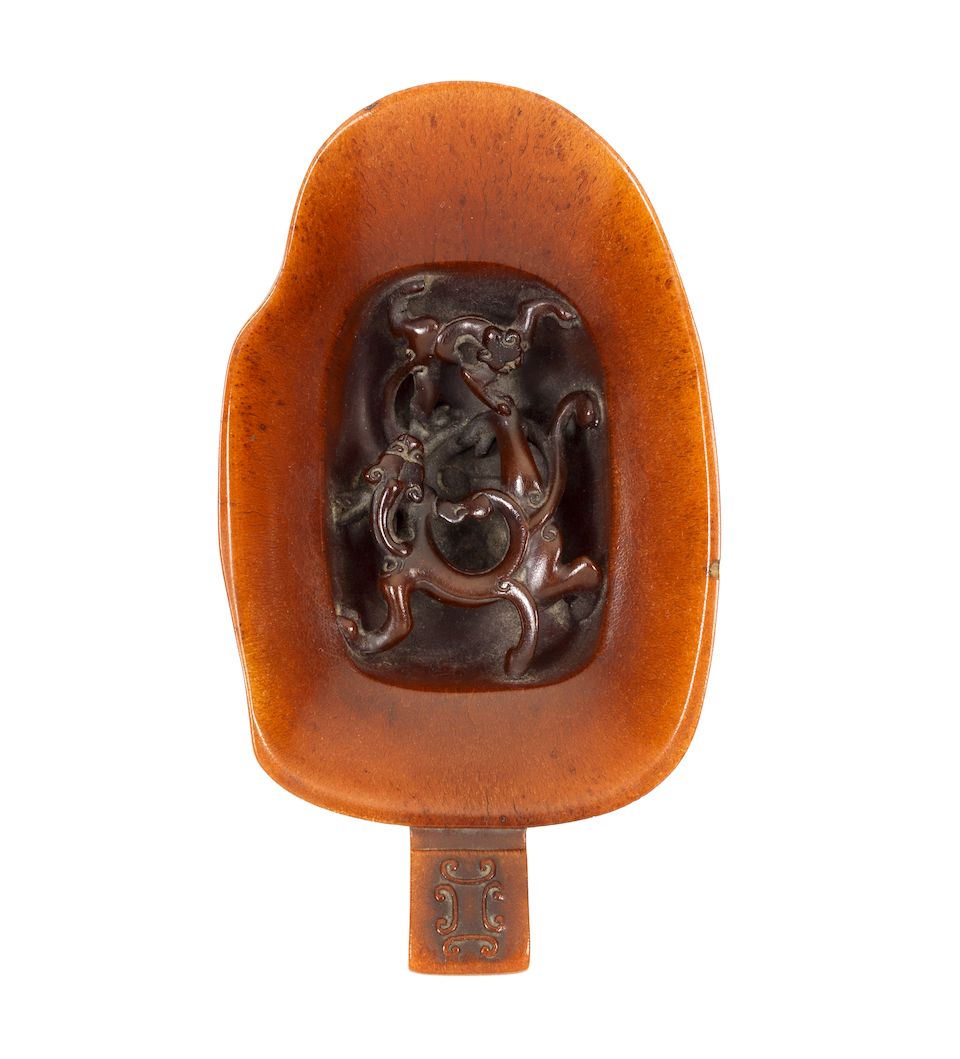 A fine and rare rhinoceros horn 'chilong' libation cup 18th century
