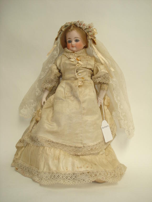 Bonhams : Belton bisque shoulder head bride doll