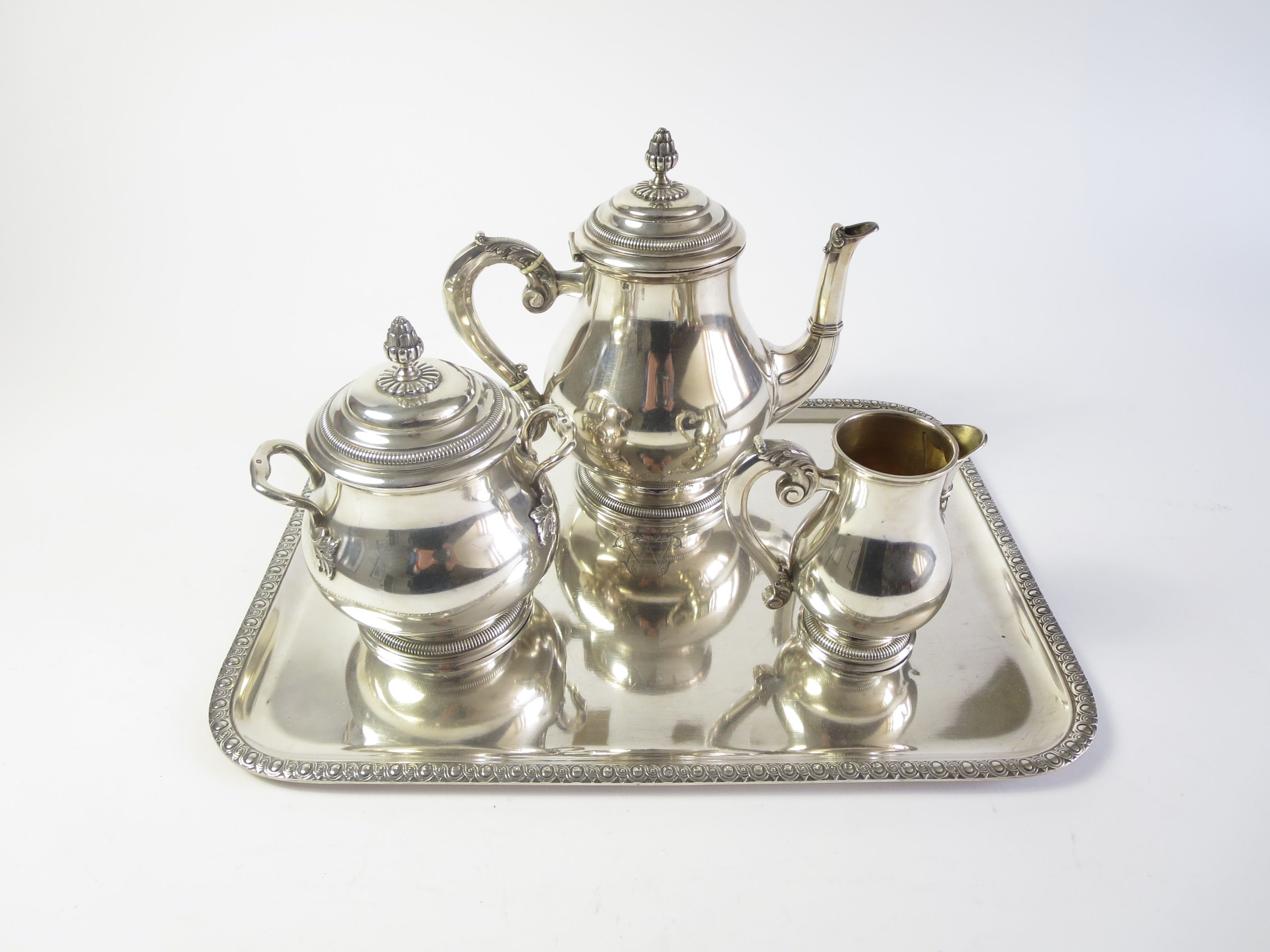 Bonhams A French three piece tea service and tray by Charles Tirbour
