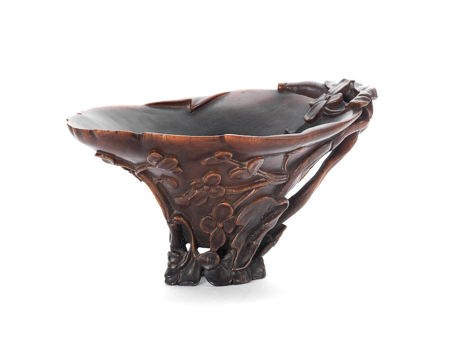 A rhinoceros horn 'prunus' libation cup 17th/18th century