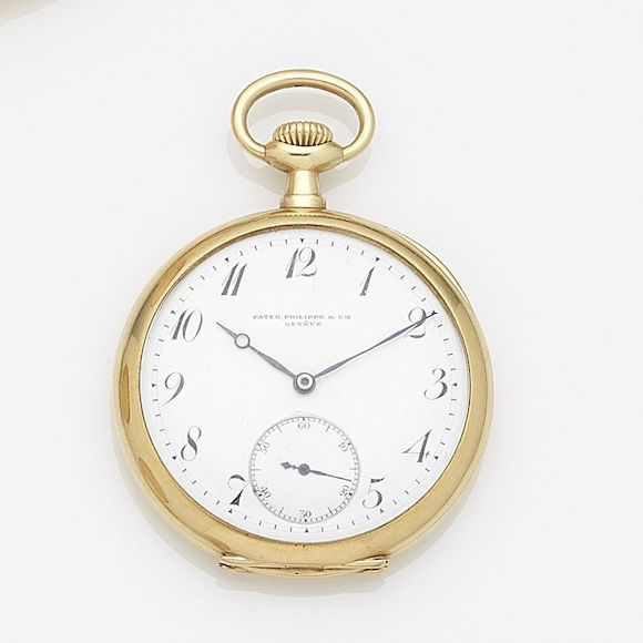 Bonhams Patek Philippe. An 18k gold keyless wind open face pocket