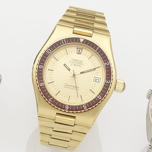 Bonhams : Omega. An 18K gold quartz electronic calendar bracelet watch ...