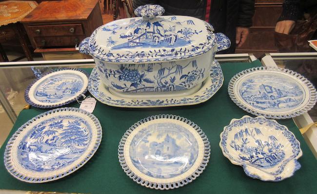 A Swansea large tureen and cover and similar platter, a Swansea shell pickle dish, and four Swansea and Glamorgan ribbon plates, early 19th century
