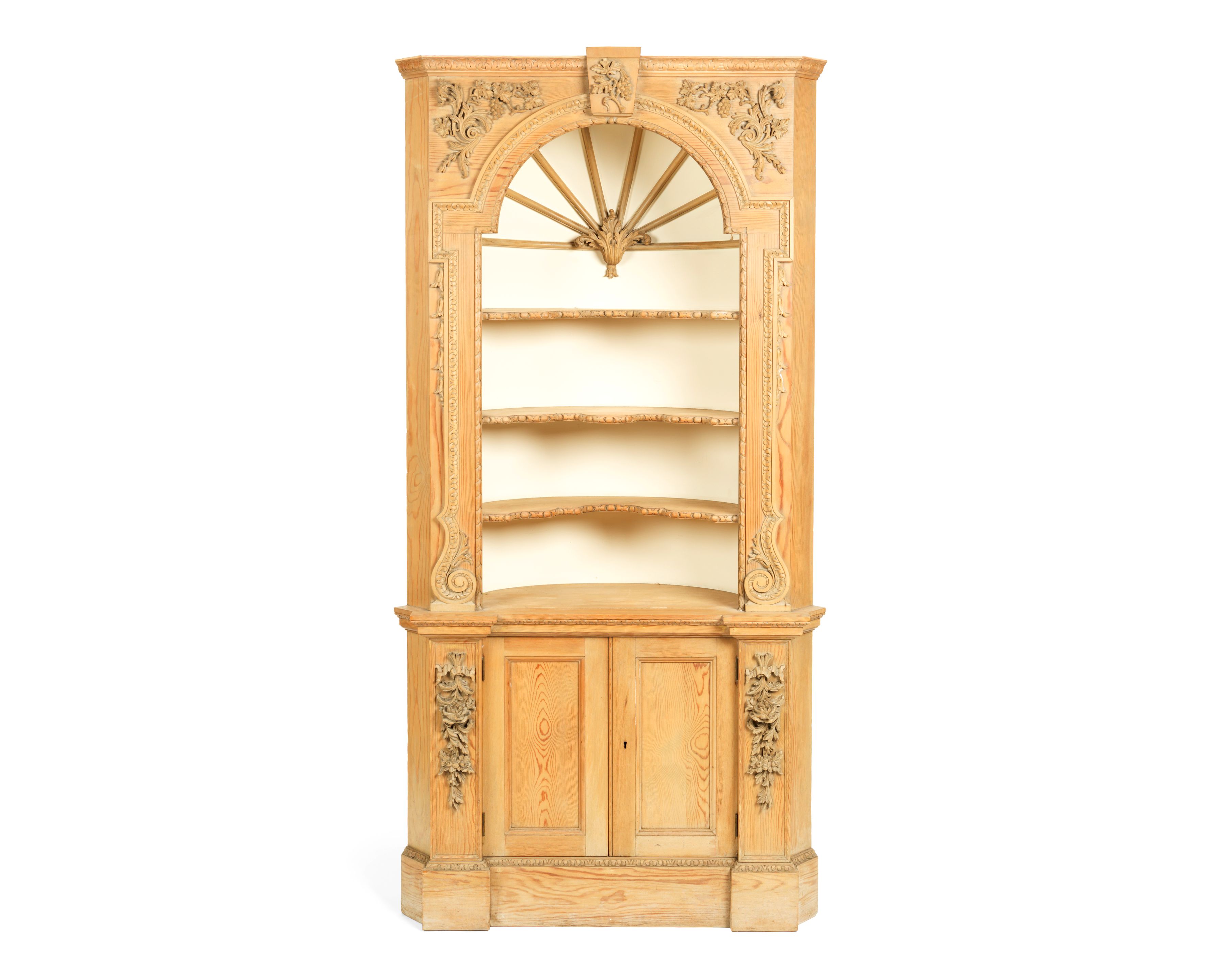 Bonhams A pine and carved pine architectural wall niche in
