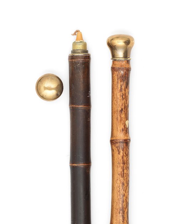 Bonhams Two 19th century brass mounted lamp lighter gadget canes