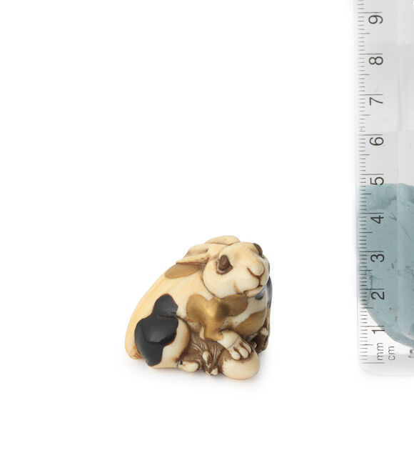 Bonhams : An ivory netsuke of a piebald rabbit Early 19th century
