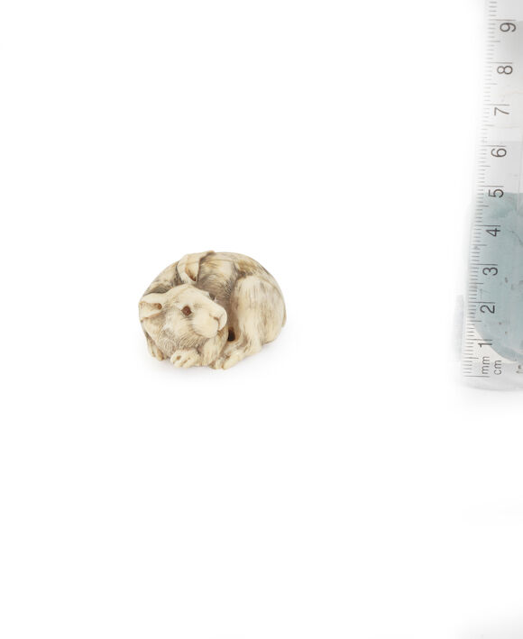 Bonhams : An ivory netsuke of a rabbit By Masatoshi, 19th century