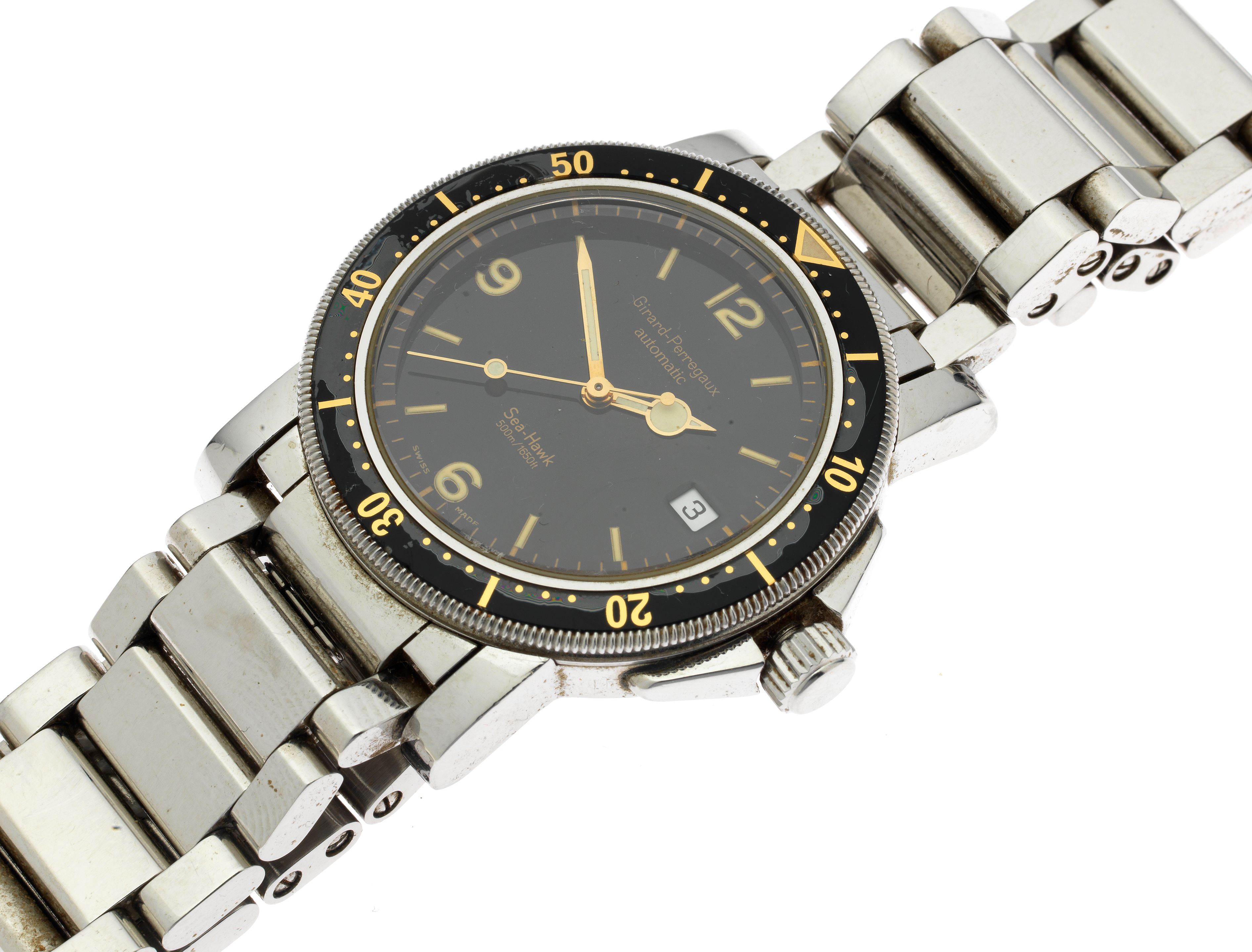 Bonhams Girard A stainless steel automatic calendar