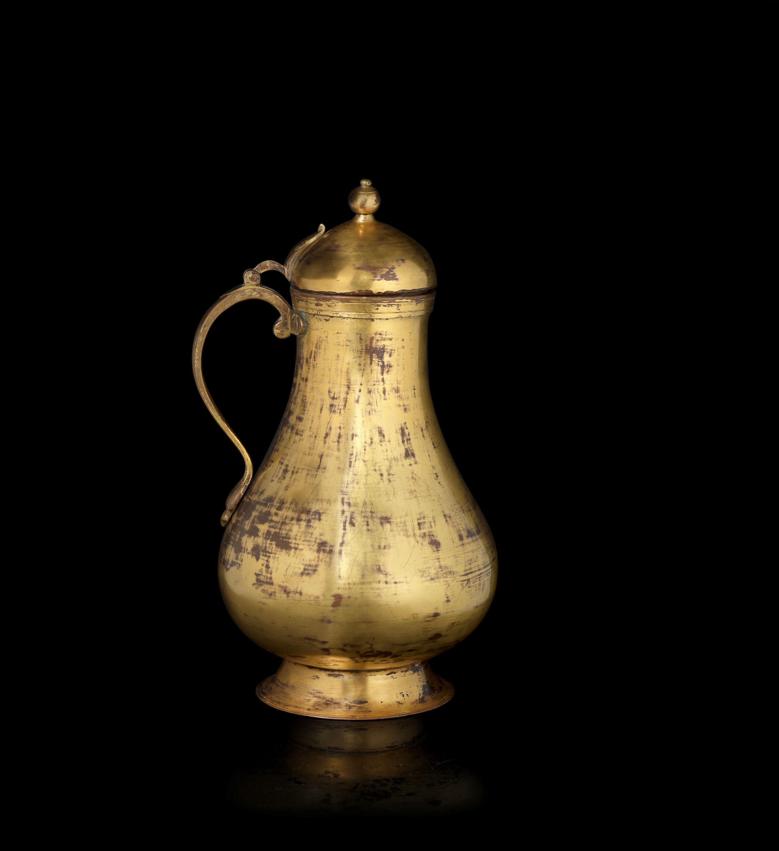 Bonhams : An Ottoman gilt copper (tombak) Ewer Turkey, 17th/ 18th Century