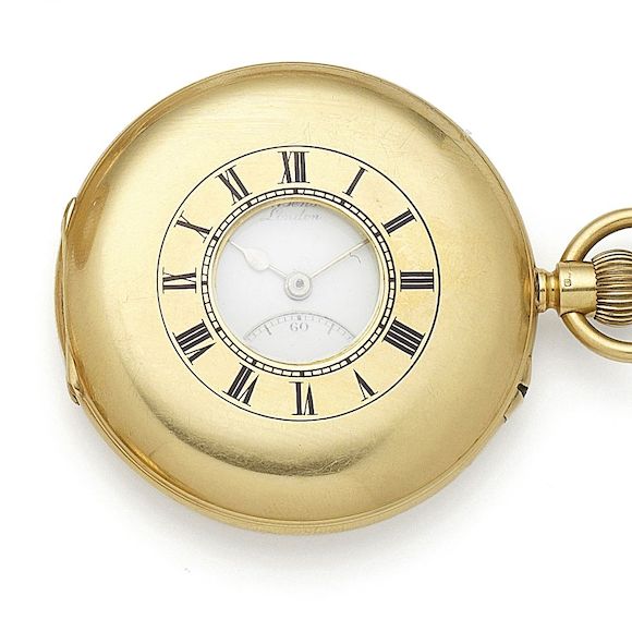 Bonhams J. W. Benson, London. An 18K gold keyless wind half hunter