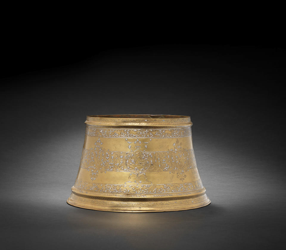 Bonhams : A silver inlaid brass Candlestick Base Persia or Mesopotamia ...
