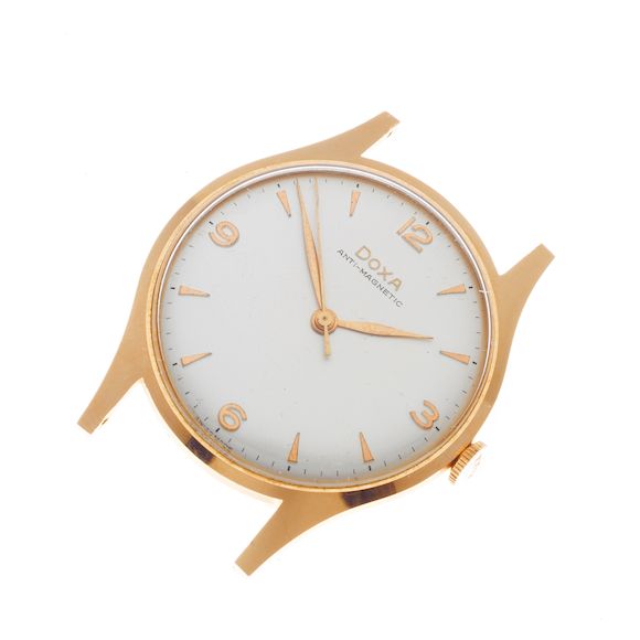 Bonhams Doxa. A 14K gold manual wind watchRef 10335, Circa 1960