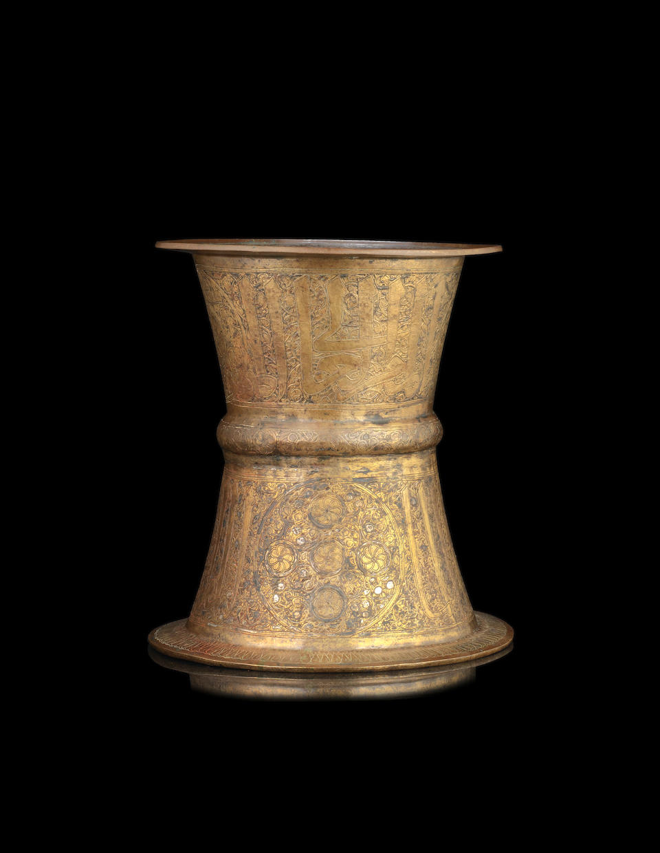 Bonhams : A rare Mamluk silver-inlaid brass tray stand Egypt, 14th Century