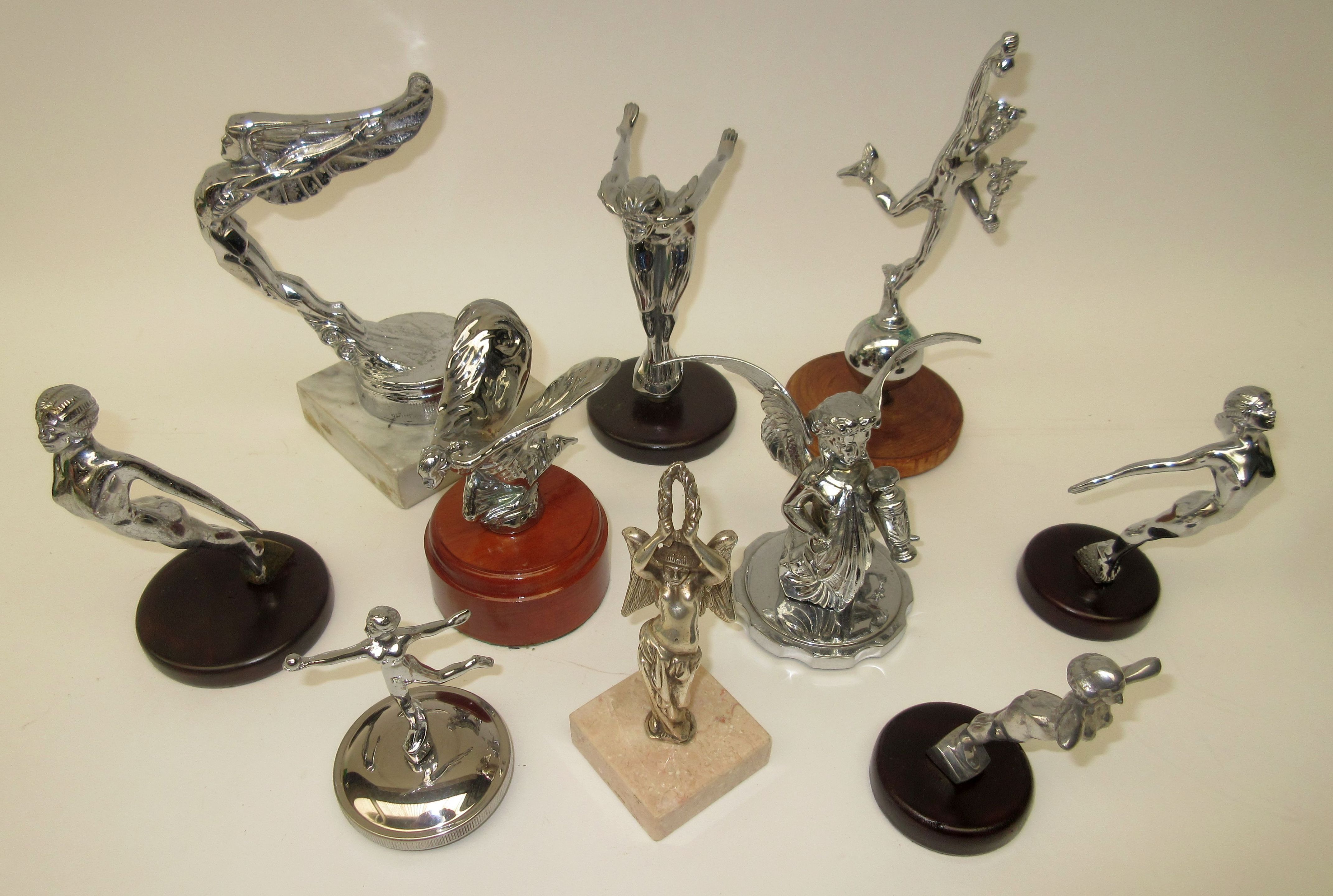 Bonhams Cars A collection of figural car mascots, (10)