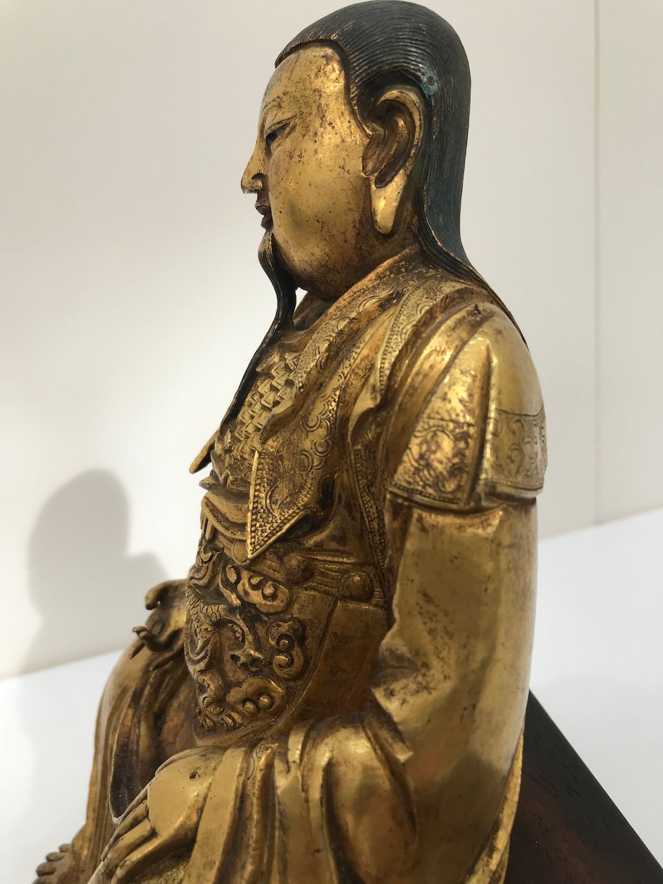 Bonhams A Chinese gilt copper alloy figure of Taoist Deity, Zhenwu