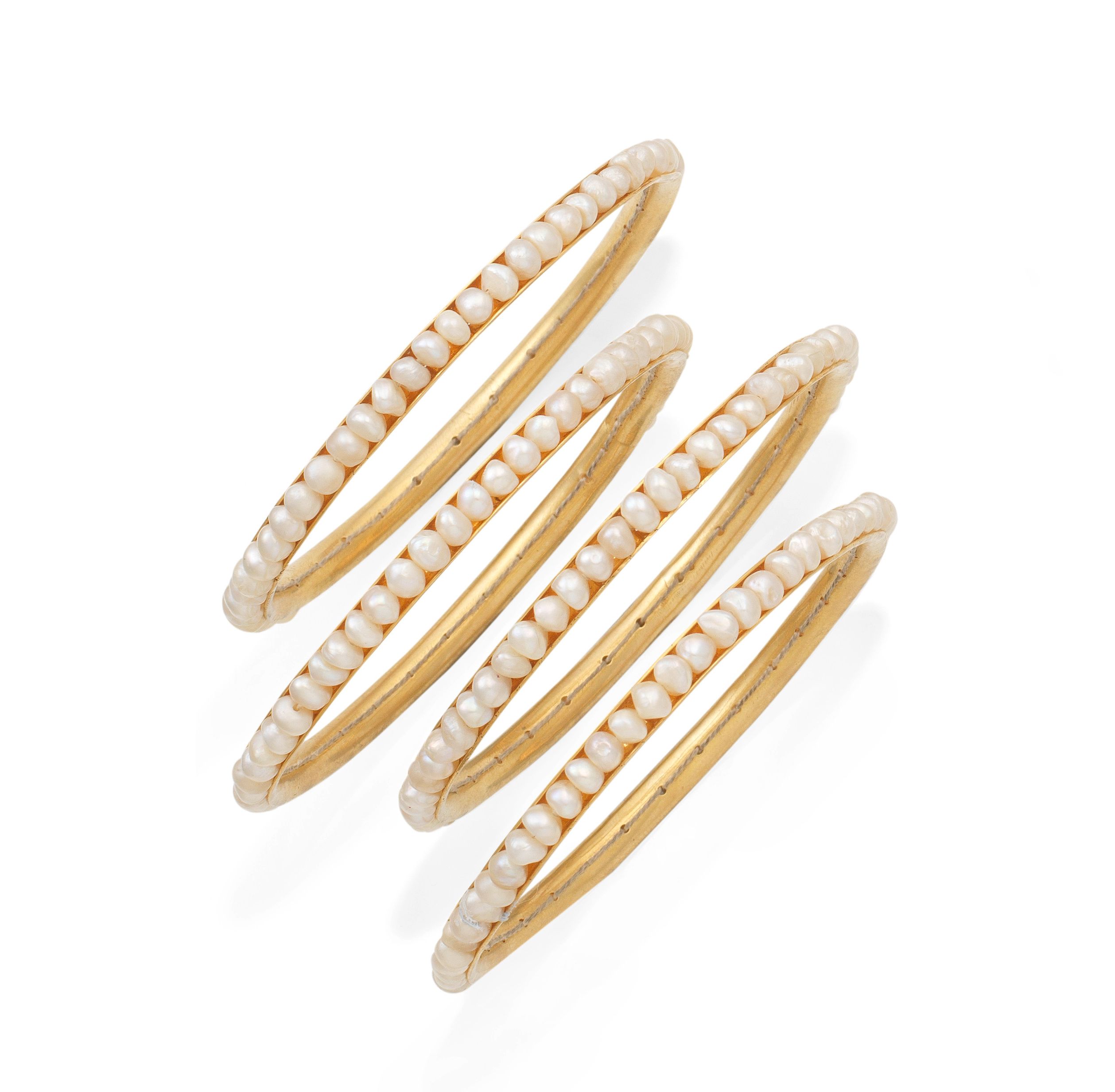 Four pearl bangles (4)