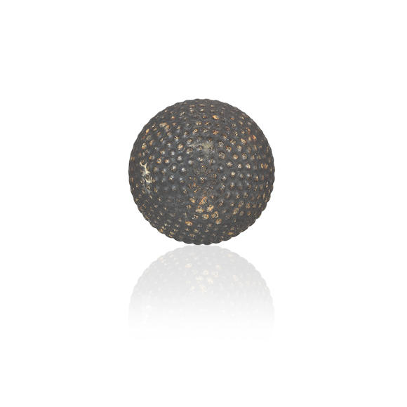 Bonhams : AN 'AGRIPPA' 27½ GUTTY GOLF BALL, CIRCA 1886