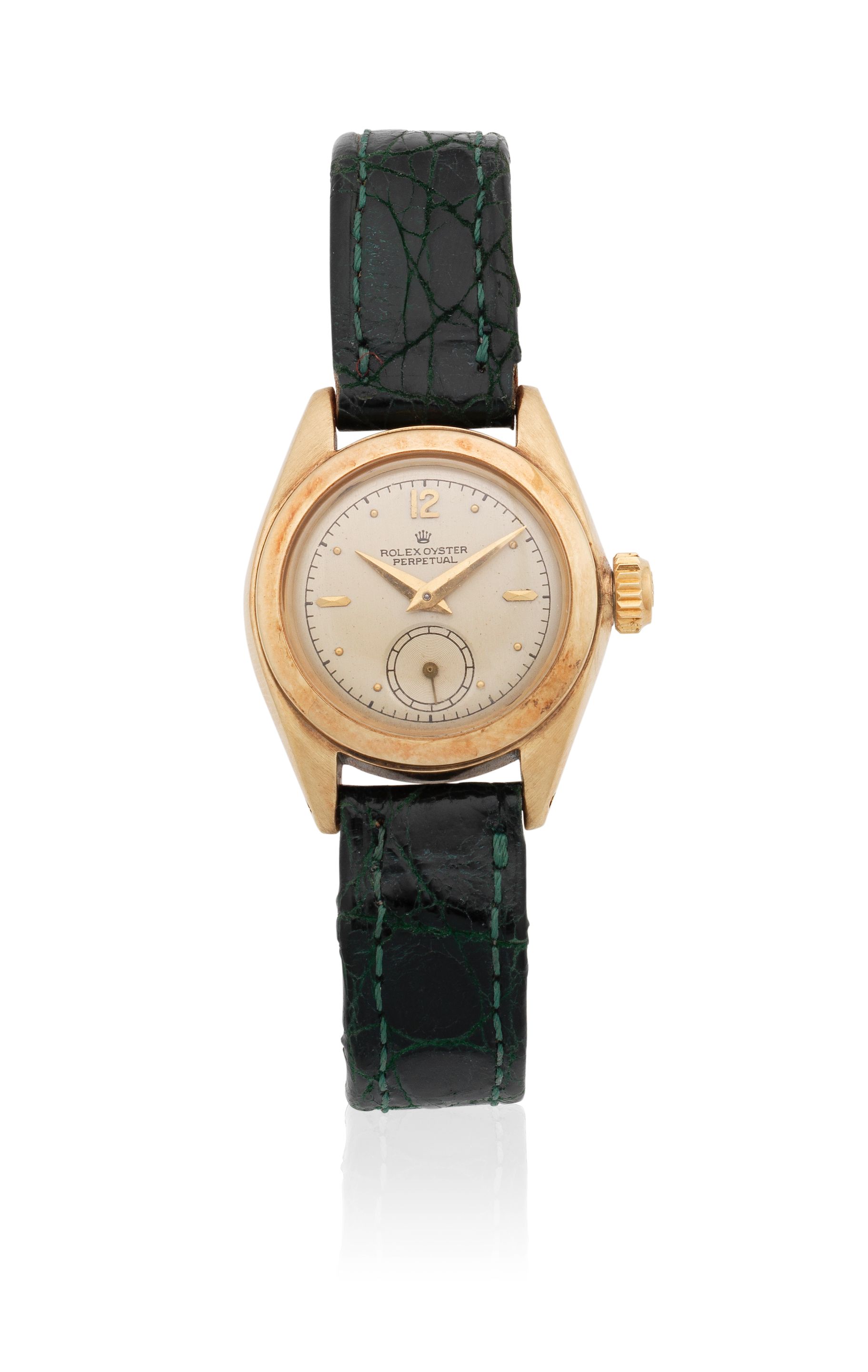 Rolex Rolex. A lady's 14K gold automatic wristwatch Oyster Perpetual, Ref: 5002, Circa 1950 · 5002