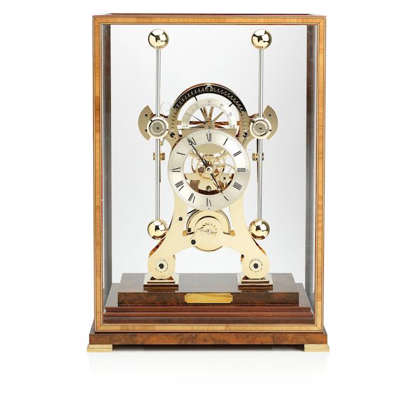 Bonhams A contemporary 'NAVIGATOR' brass and walnut mouted Skelton