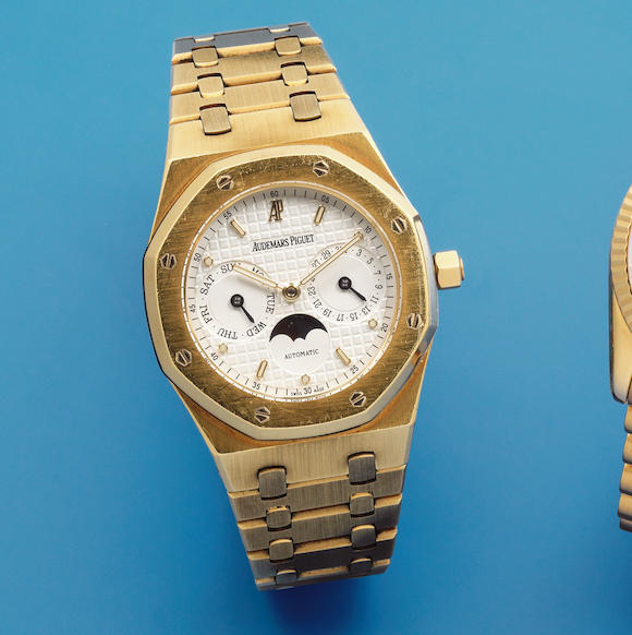 Bonhams : Audemars Piguet. An 18K gold automatic calendar bracelet ...