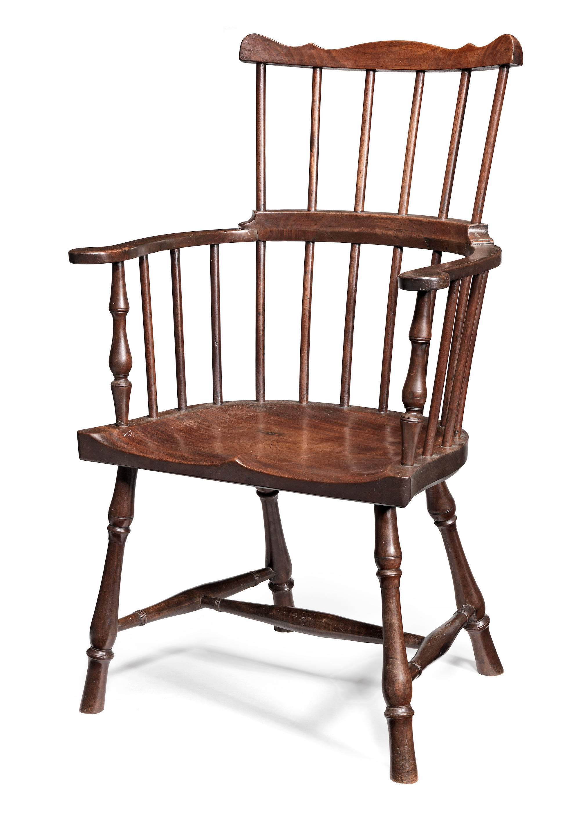 A rare early George III mahogony comb-back Windsor chair, West Country...