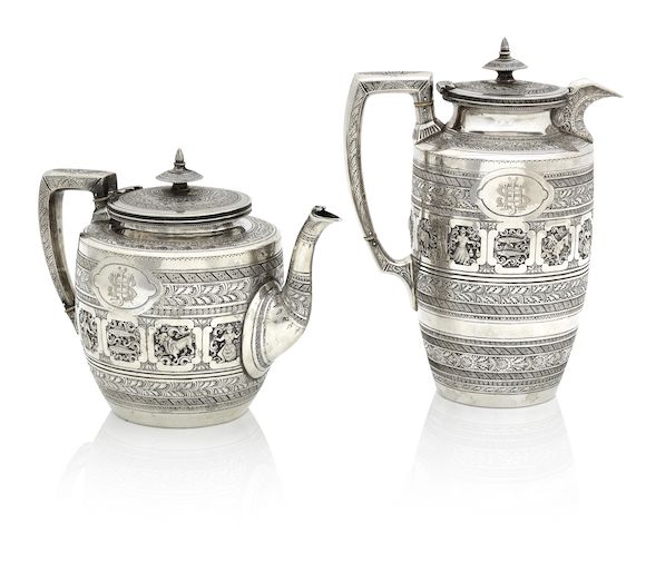 Bonhams A Victorian silver 'Zodiac pattern' teapot and hot water pot