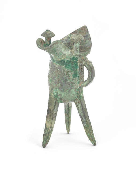 Bonhams : An archaic bronze ritual wine vessel, Jue Shang Dynasty