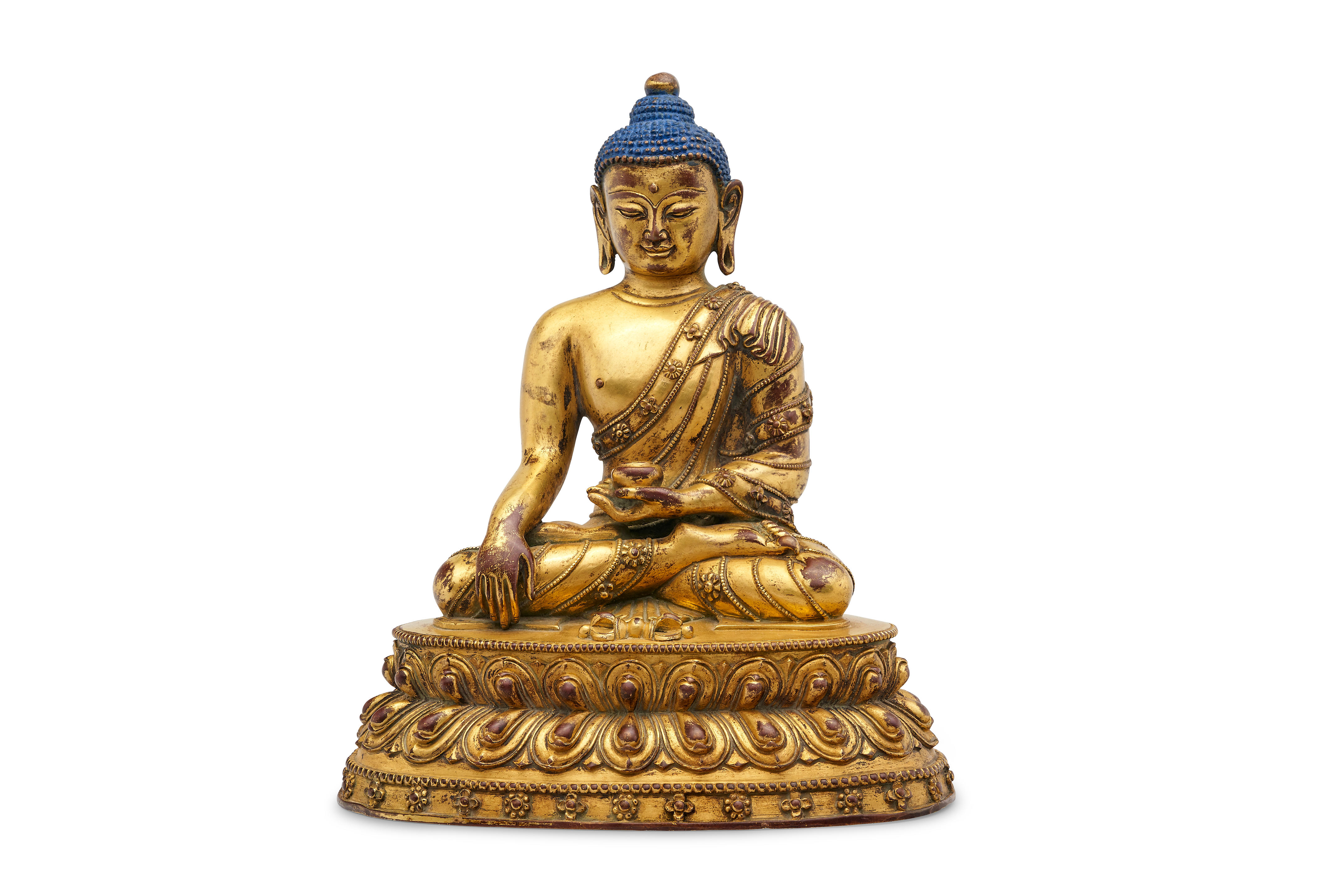 A gilt bronze figure of Shakyamuni